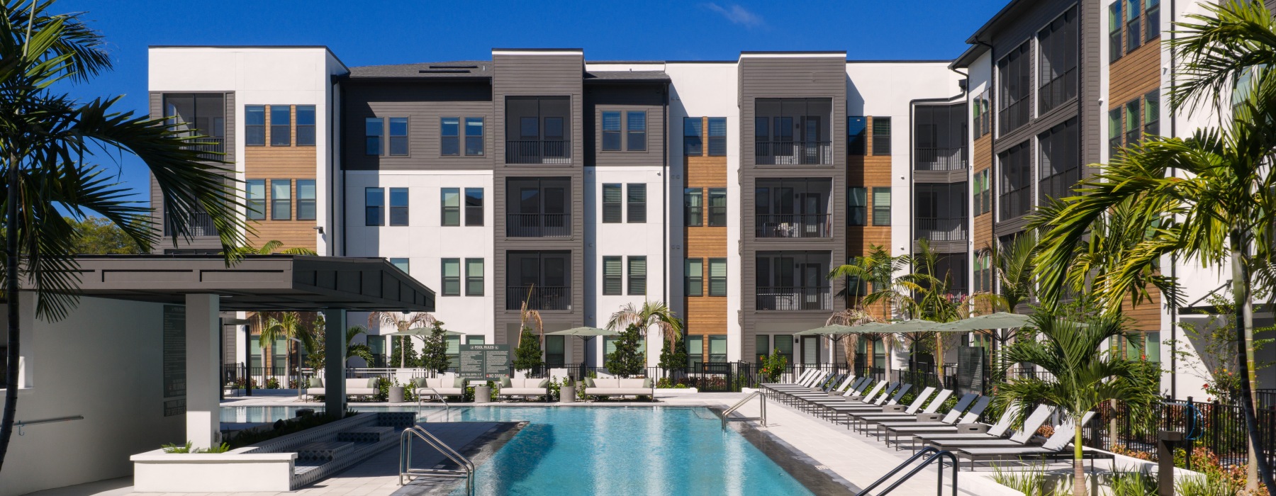a pool in front of a building