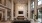 fireplace and seating with a tv in a two story room 