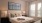 Bedroom with bed and side tables with a large window
