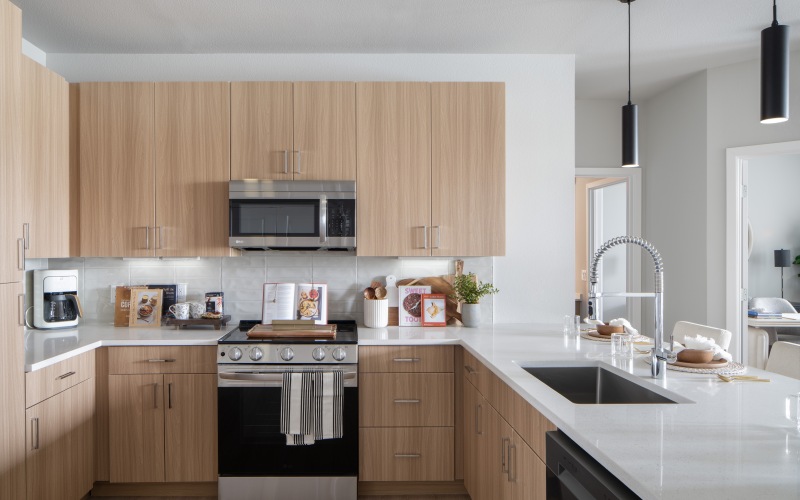 kitchen with white counters and ample cabinets