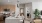 kitchen with bar stools and a plant